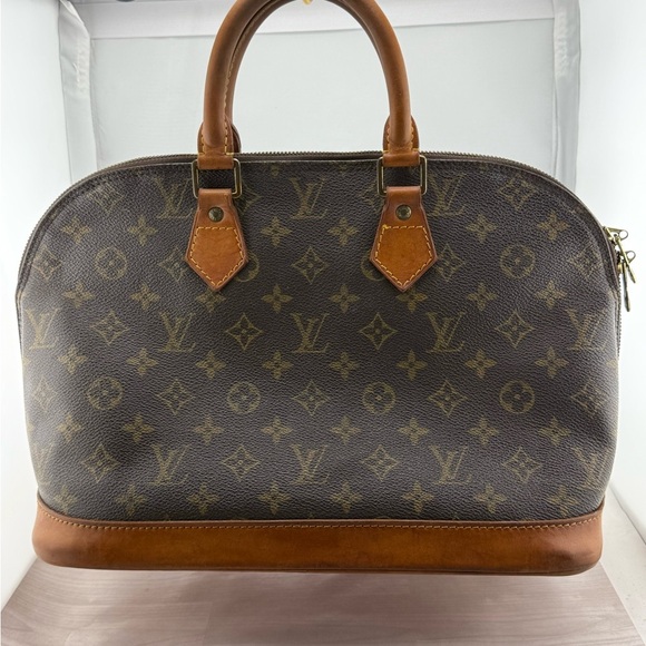 Louis Vuitton Authenticated Alma Satchel with Monogram Pattern - Picture 1 of 10